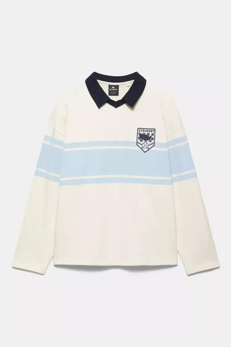Polo-manga-larga-paneles.webp